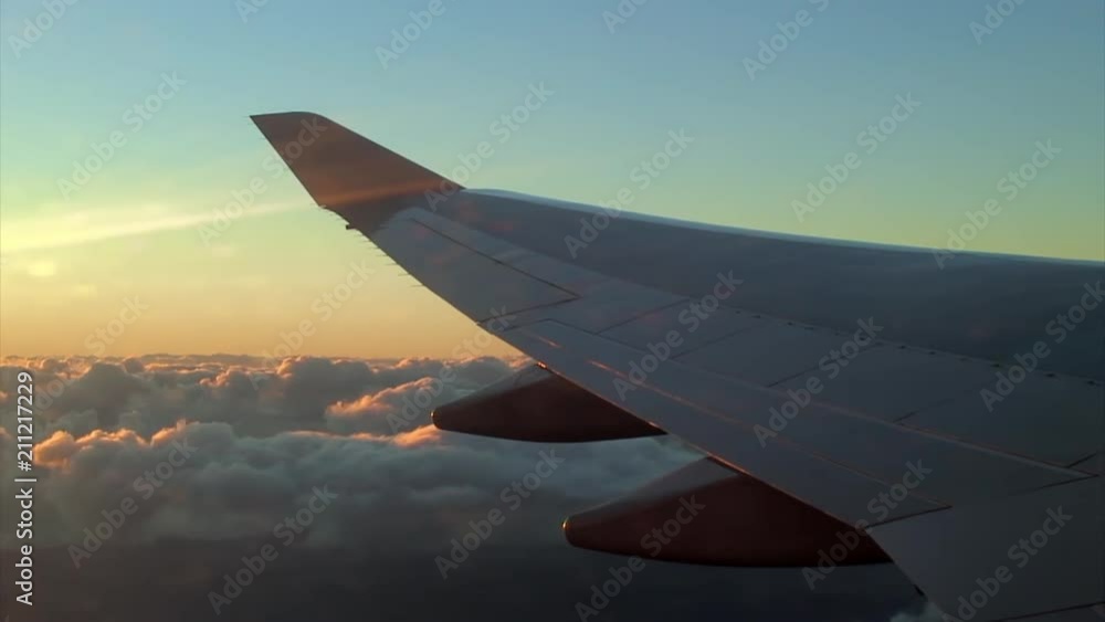 Flying above a Cloud Layer at Sunset Flying above a Cloud Layer at Sunset