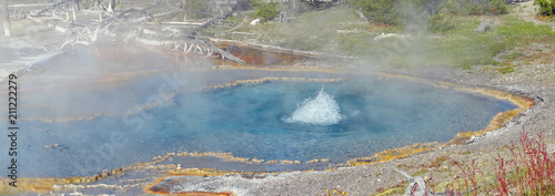 Firehole Spring boiling up on Firehole Lake Drive in Yellowstone National Park in Wyoming United States