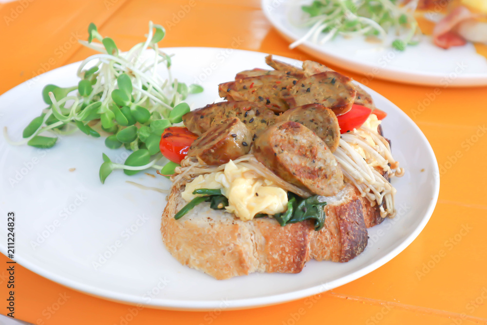 sausage sandwich or baguette with sausage topping sausage sandwich or baguette with sausage topping