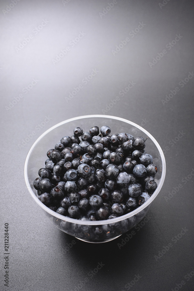 forest berry blueberry on a black background. forest berry blueberry on a black background.