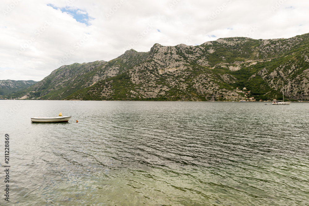 Romantic Mediterranean cloudly landscape. Montenegro, view of Bay of Kotor. Romantic Mediterranean cloudly landscape. Montenegro, view of Bay of Kotor.