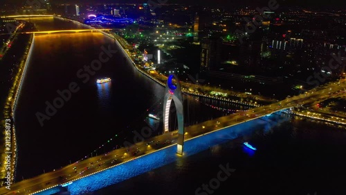 Night traffic in Liede Bridge by Pearl River of Guanghzou City, Guangdong, China. photo