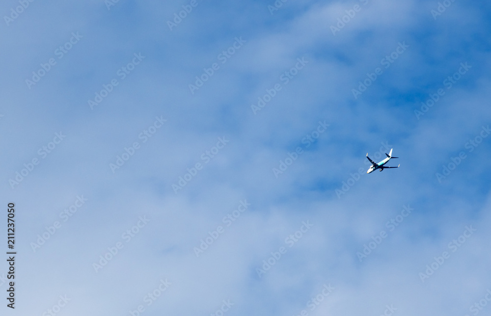 The plane fly high in the blue sky in the morning The plane fly high in the blue sky in the morning
