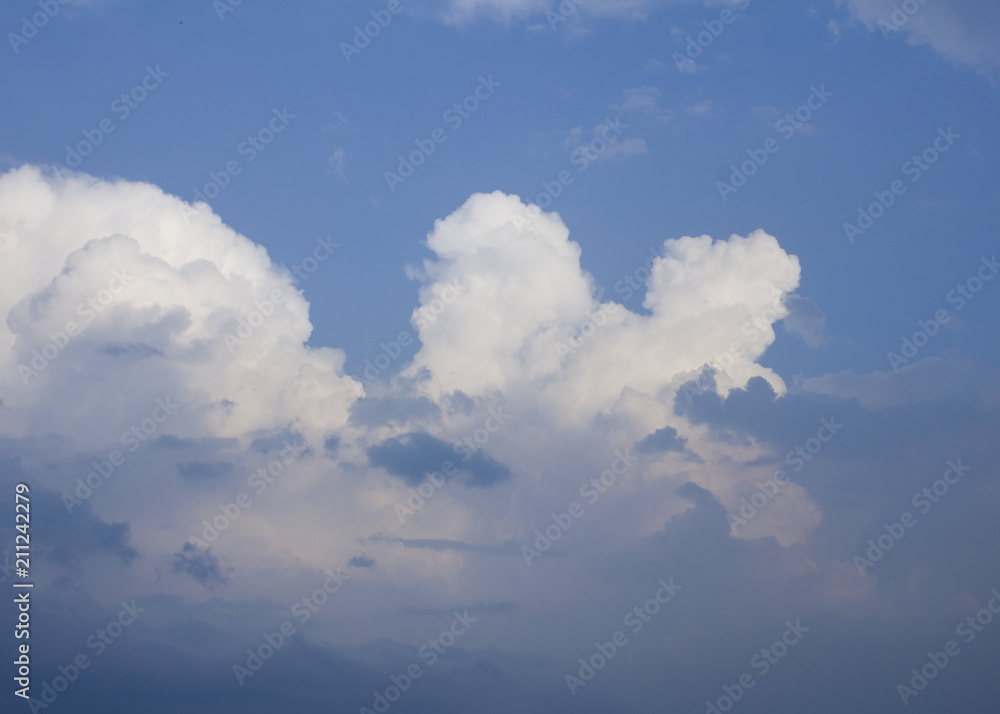 Beautiful cumulus clouds on blue sky background. Beautiful cumulus clouds on blue sky background.