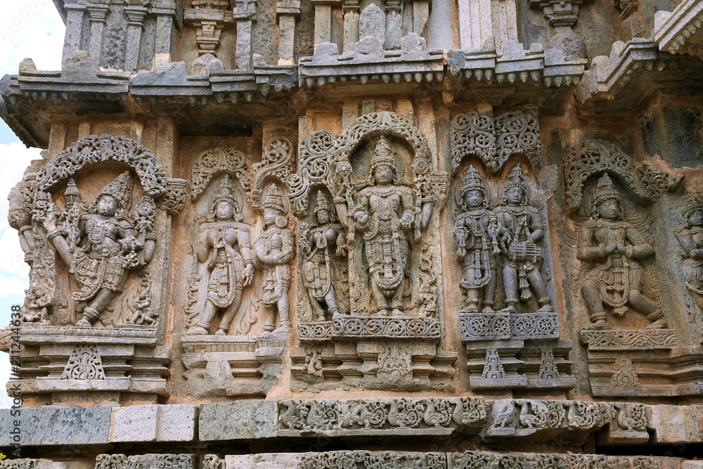 Ornate bas relieif and sculptures of Hindu deities, Kedareshwara Temple, Halebid, Karnataka