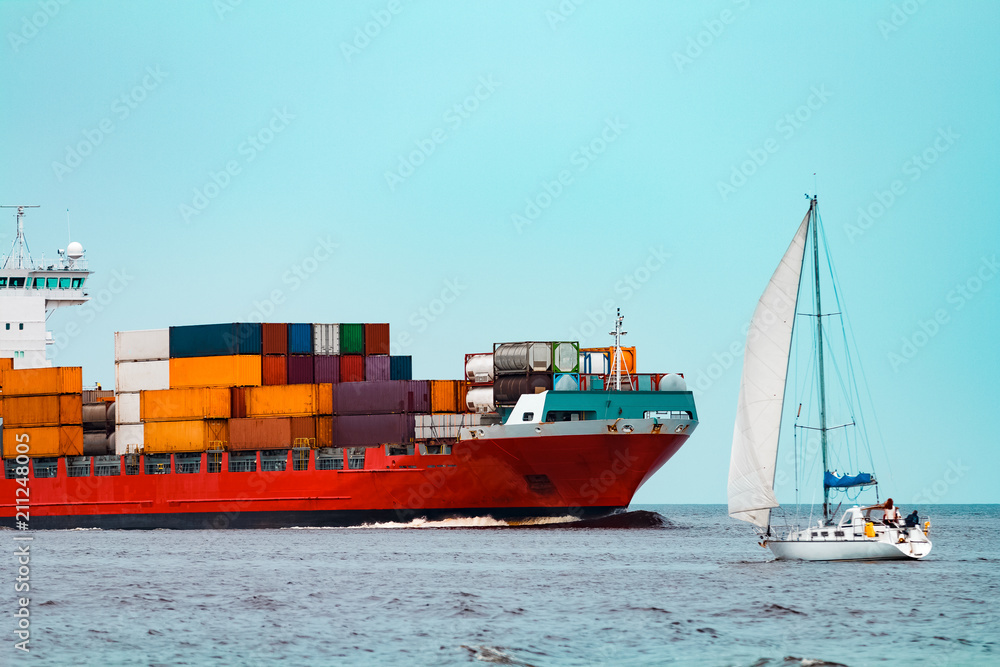 Fototapeta premium Red container ship underway