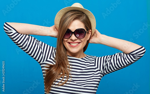Close up portrait of summer style casual dressed smiling girl.