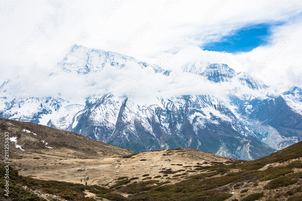 A small group of tourists in the Himalayas, Nepal.