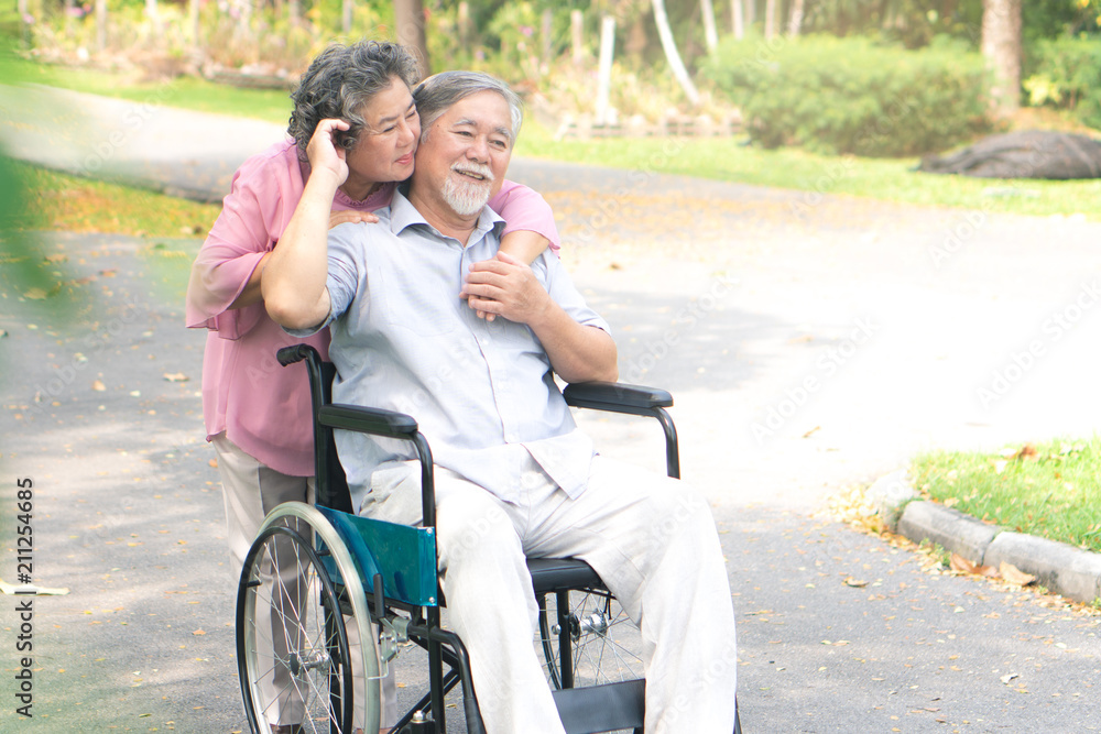 Happy elderly couple with lifestyle after retiree concept. Lovely asian seniors couple embracing together in the park in the morning. Happy elderly couple with lifestyle after retiree concept. Lovely asian seniors couple embracing together in the park in the morning.