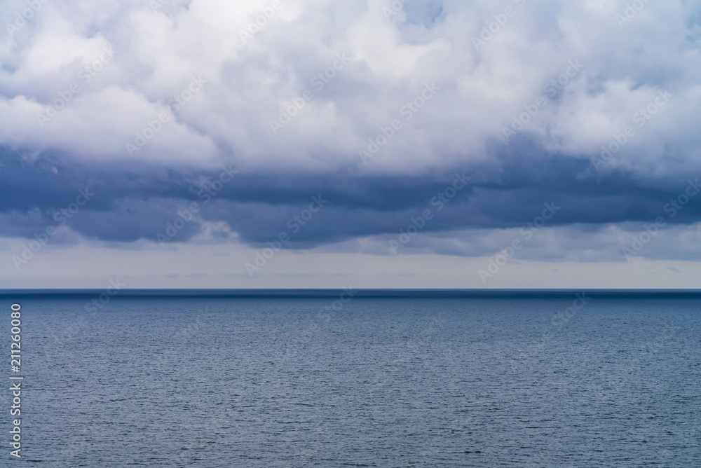 dense rain clouds over the sea