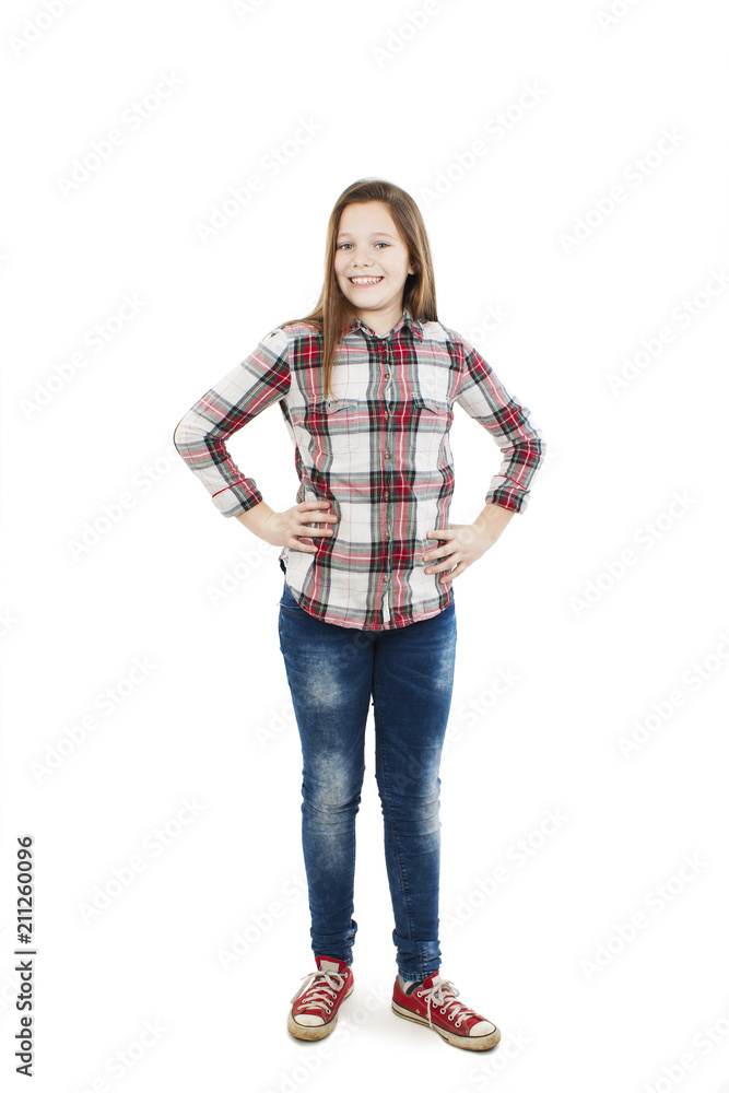 Smiling teenage girl poses for a picture. Isolated on white background Smiling teenage girl poses for a picture. Isolated on white background