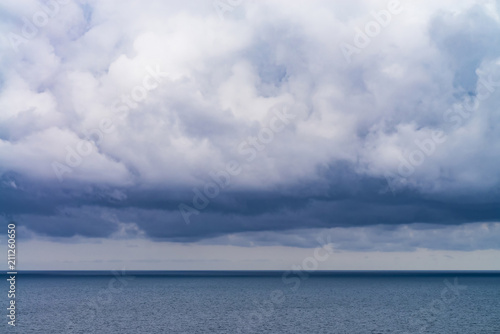 dense rain clouds over the sea