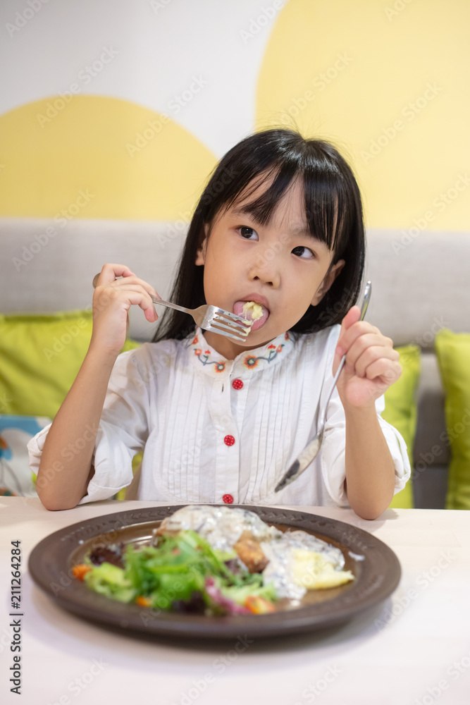 Asian Little Chinese Girl Eating Western Food Asian Little Chinese Girl Eating Western Food