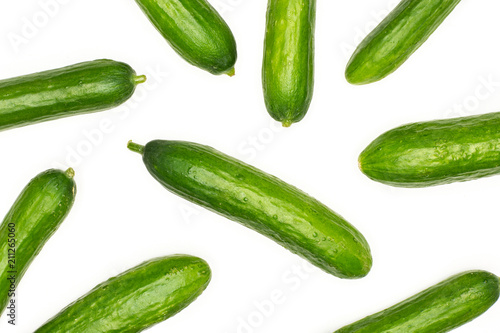 Fresh mini cucumbers flatlay isolated on white background.