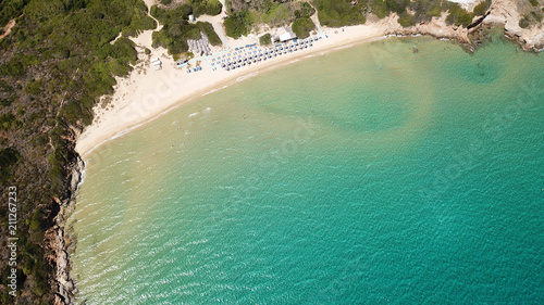 Aerial drone bird's eye view photo of famous turquoise water sandy beach of Psili Amos near port of Gavrio, Andros island, Cyclades, Greece