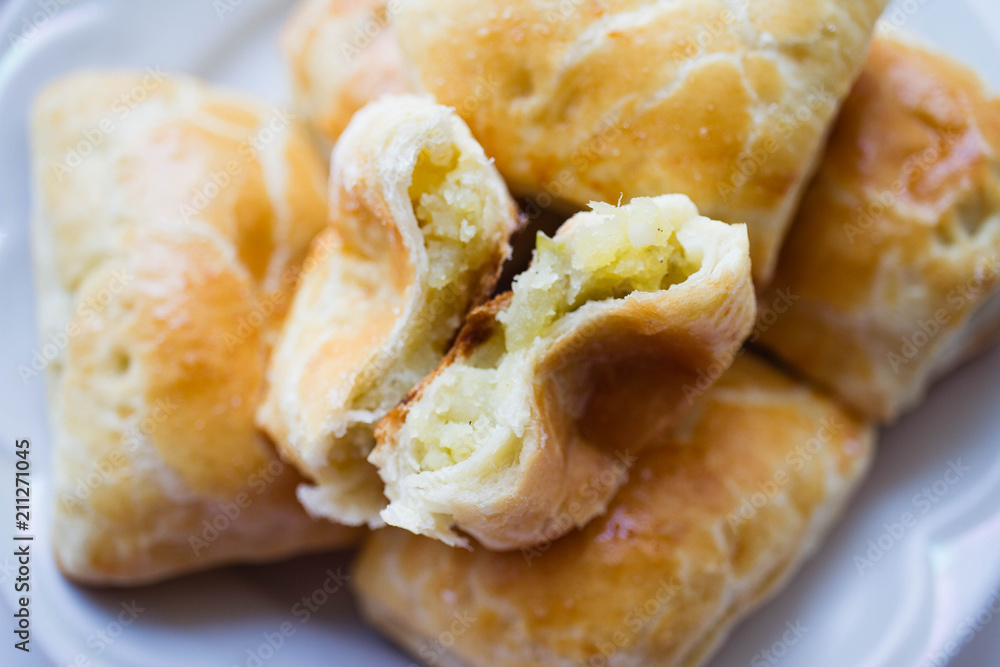 puff patty with cheese on plate puff patty with cheese on plate