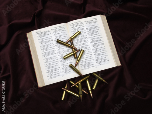 Bible and bullets photo