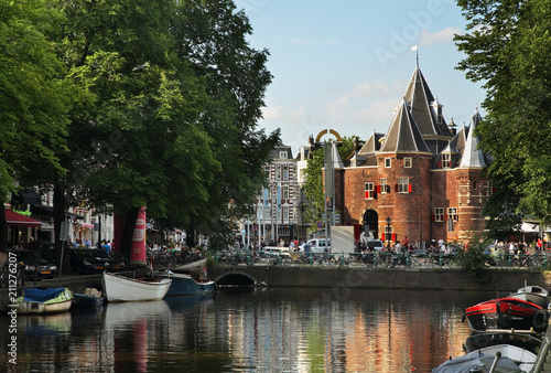 Photography Kloveniersburgwal channel and De Waag - old scales in Amsterdam