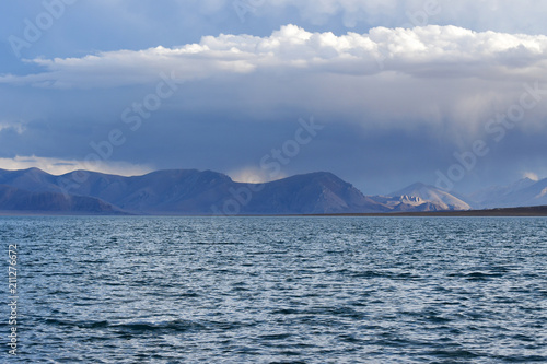 Western Tibet. Sacred lake Dangra (Dang Ra Gyu Tso) in summer evening in cloudy weather