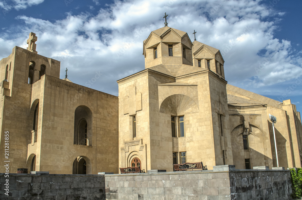 Side view of the corner windows and the bell tower of Cathedral St. Gregory Illuminator, along the street of Yervand Kochar in the capital of Armenia Yerevan




