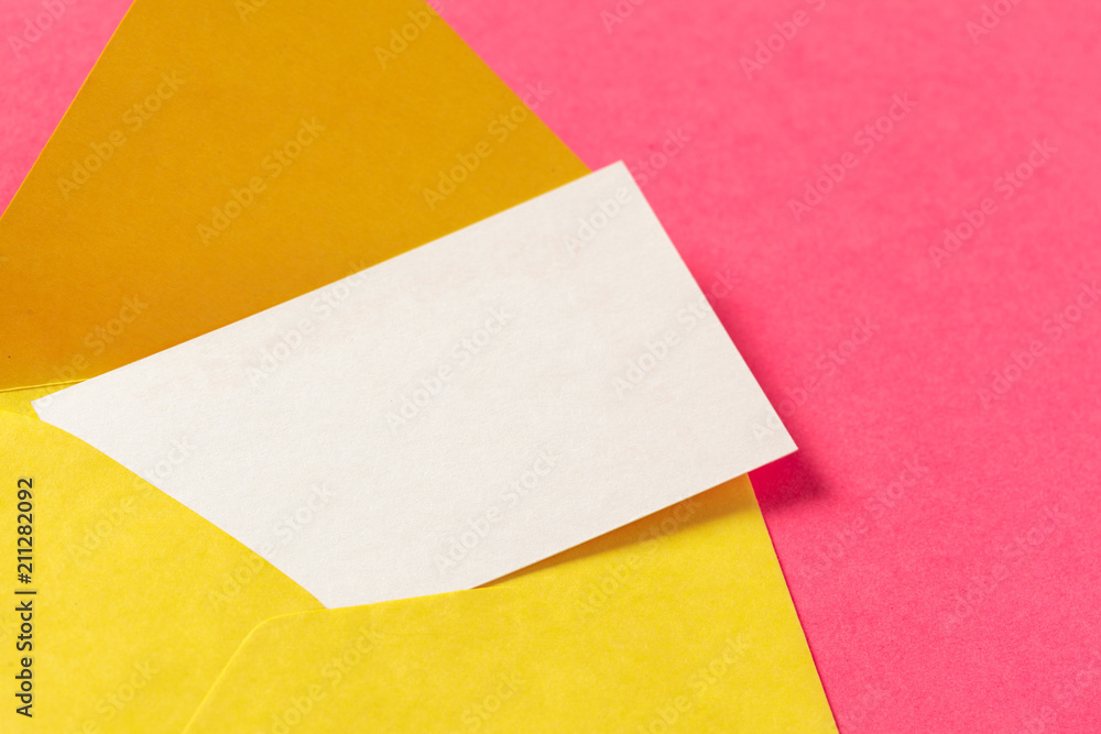 Paper envelopes on a colored pink background Paper envelopes on a colored pink background