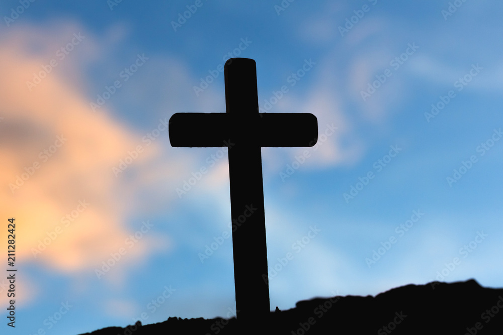 Silhouette jesus christ on cross background Abstract for christian religion at sunset