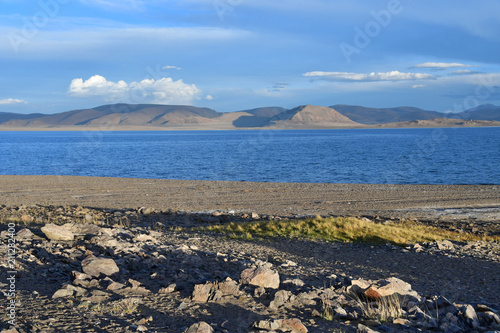 Western Tibet. Sacred lake Dangra (Dang Ra Gyu Tso) in summer evening in cloudy weather photo