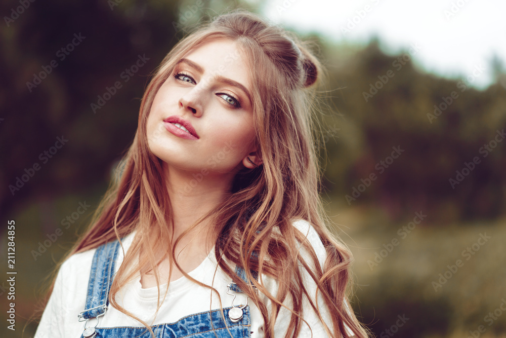 Outdoors portrait of beautiful young girl Outdoors portrait of beautiful young girl