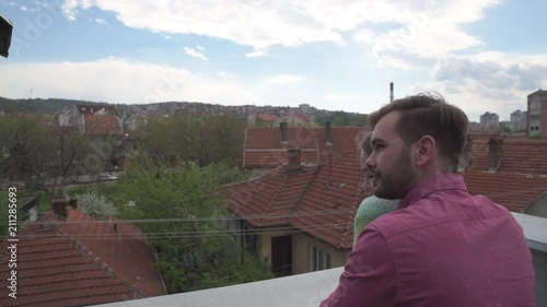 Warming up his love with a blanket on a windy day