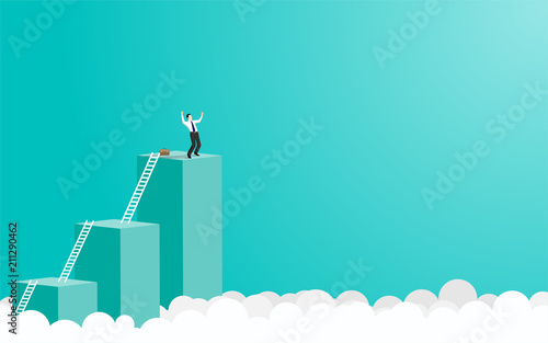 Businessman happy standing on the top of the graph