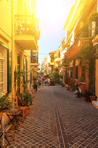 Fototapeta Naklejka Na Ścianę i Meble -  Authentic narrow colorful mediterranean street in Cretan town of Chania, island of Crete, Greece