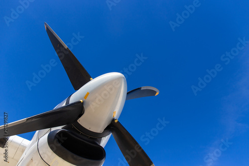 Photos bottom view of aircraft propeller blade and turboprop engines with blue sky back