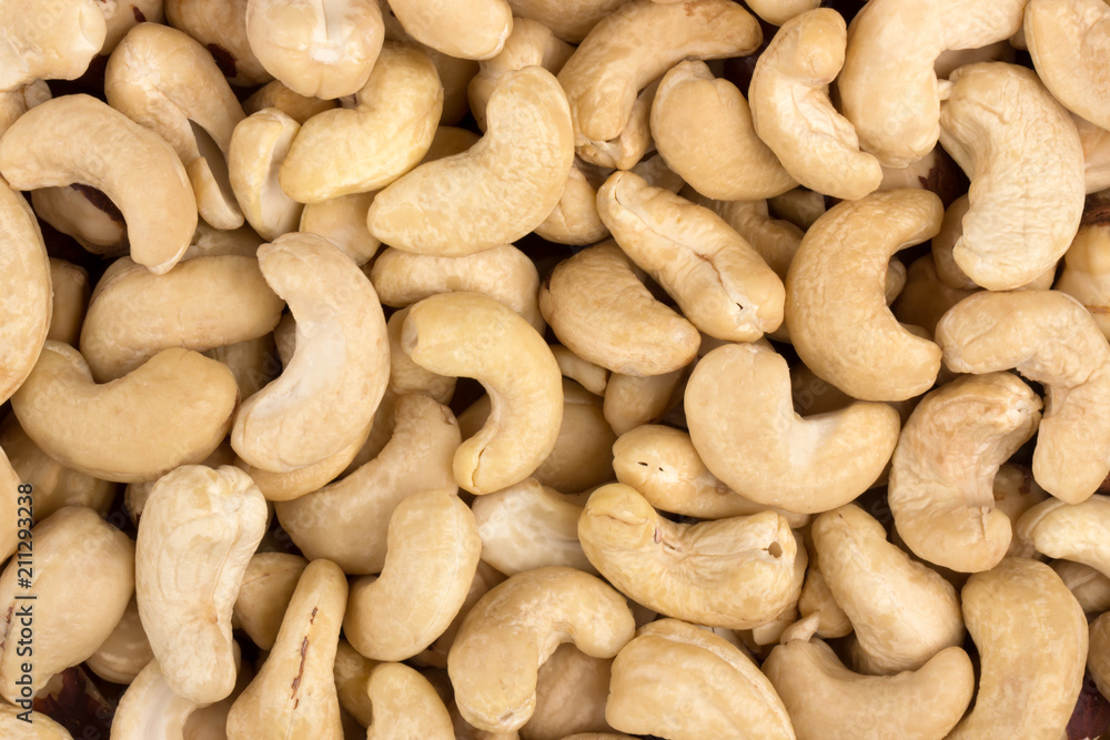 fried cashew nuts close-up, top view, cashew background fried cashew nuts close-up, top view, cashew background