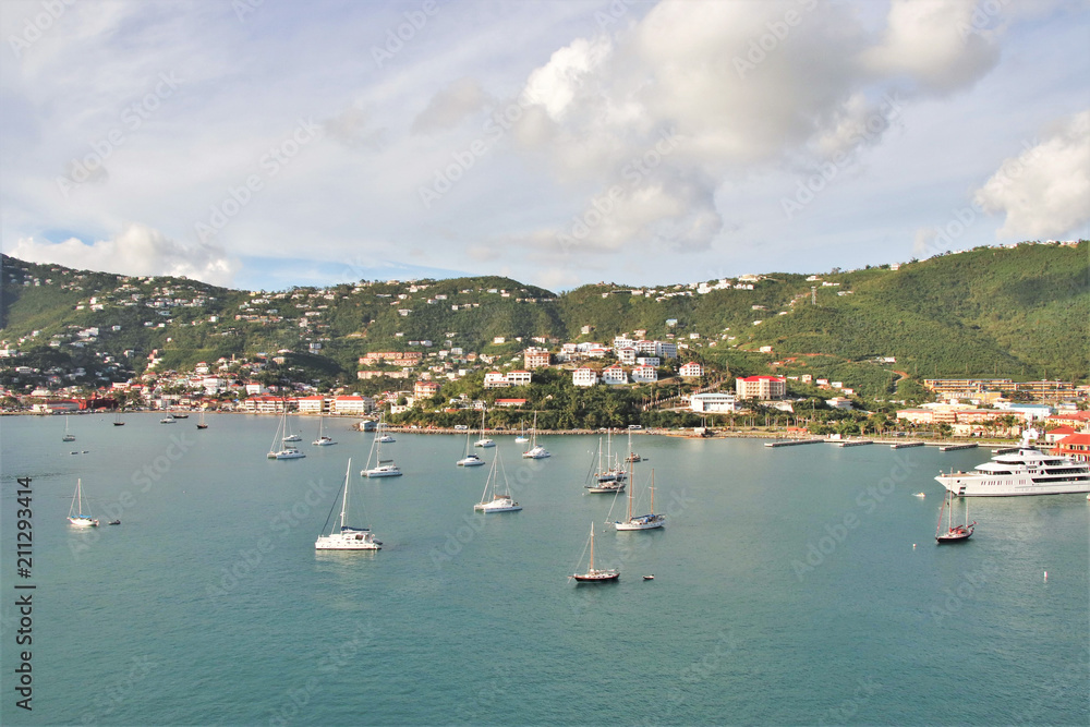 Sailboats on the ocean with mountains in the background on the island of St. Thomas