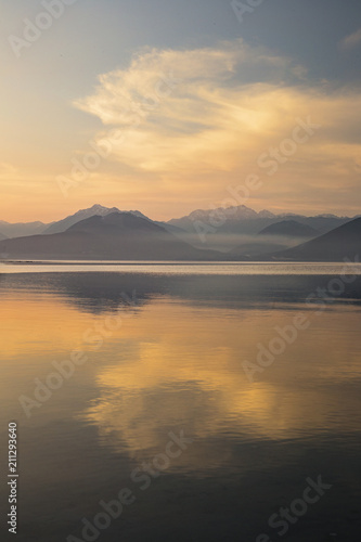 Misty sunset over the Olympic mountains