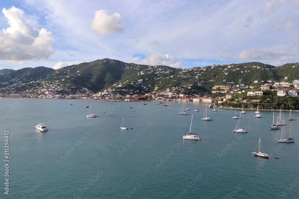 Sailboats on the ocean with mountains in the background on the island of St. Thomas