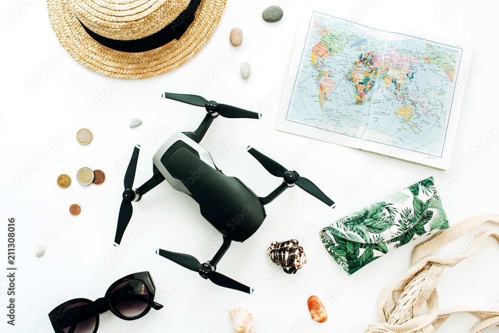 Summer travel concept. World map, drone, straw, sunglasses, coins on white  background. Flat lay, top view blog hero header. foto de Stock | Adobe Stock