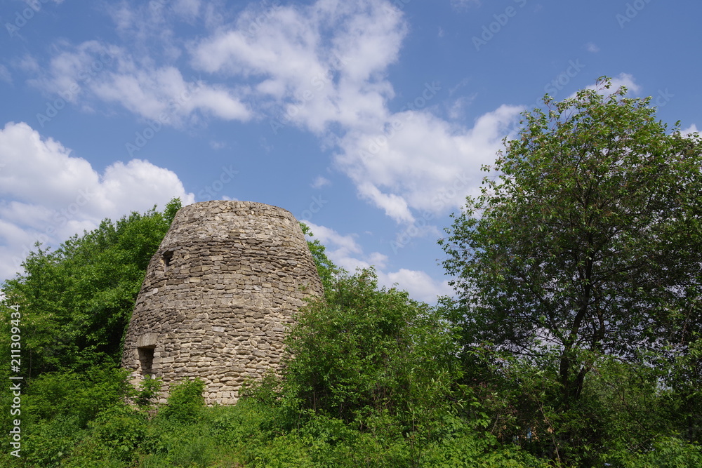 stone fortress tower by the forest