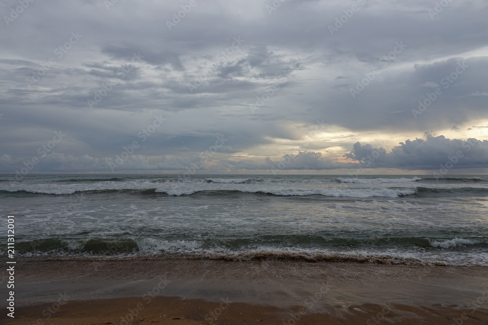 Seascape of the Indian ocean at sunset. The coast of Sri Lanka