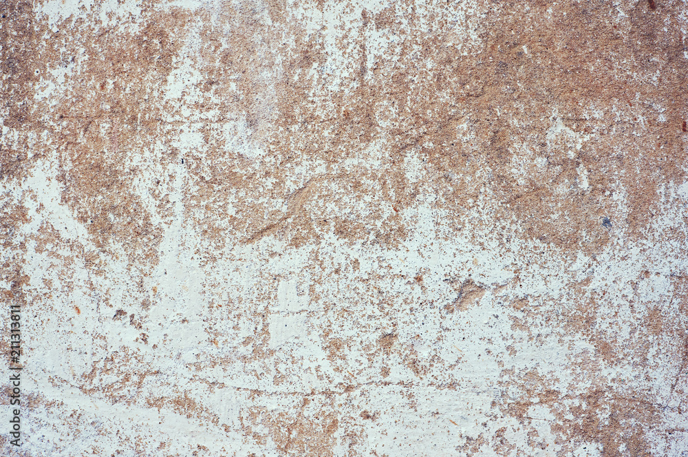 Old shabby beige shabby concrete background. Abstract background.