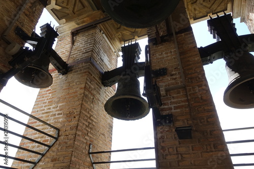 Ancient bells of different sizes. Bells of metal with rust and s