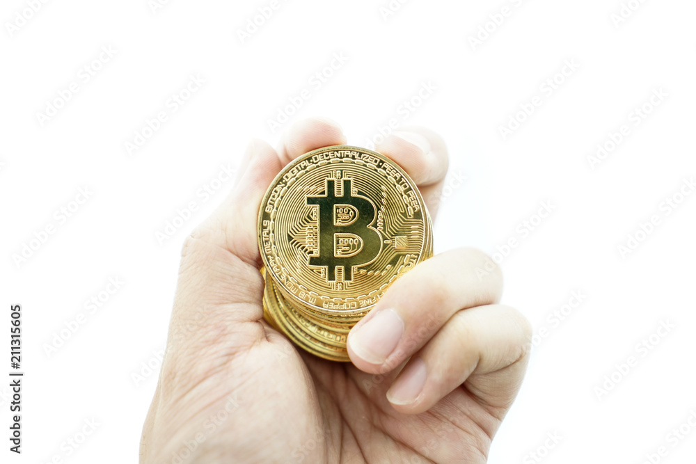 hand with golden bitcoin coin on the white background. hand with golden bitcoin coin on the white background.