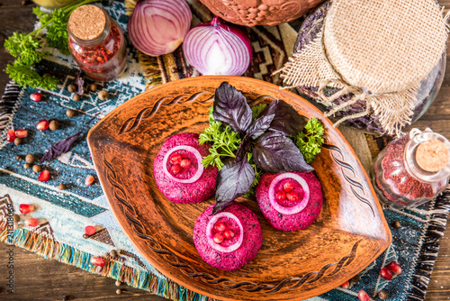 Traditional Georgian cuisine snacks - rolls of eggplant and 