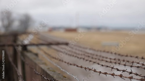 Barbed wire on the fence near airport