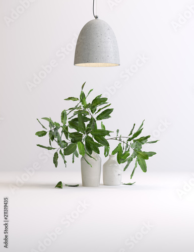 Composition of a vase with flowers under a lamp