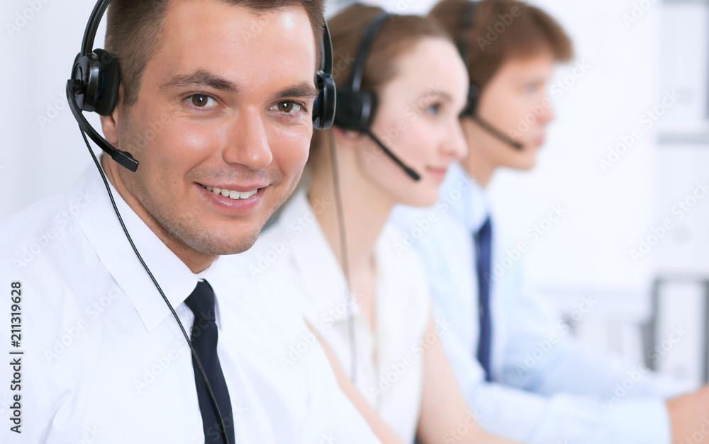 Young business man in headset. Call center Young business man in headset. Call center