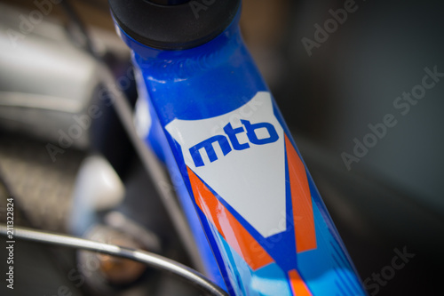 The top of the mountain bike frame is near the helm. With the inscription MTB photo