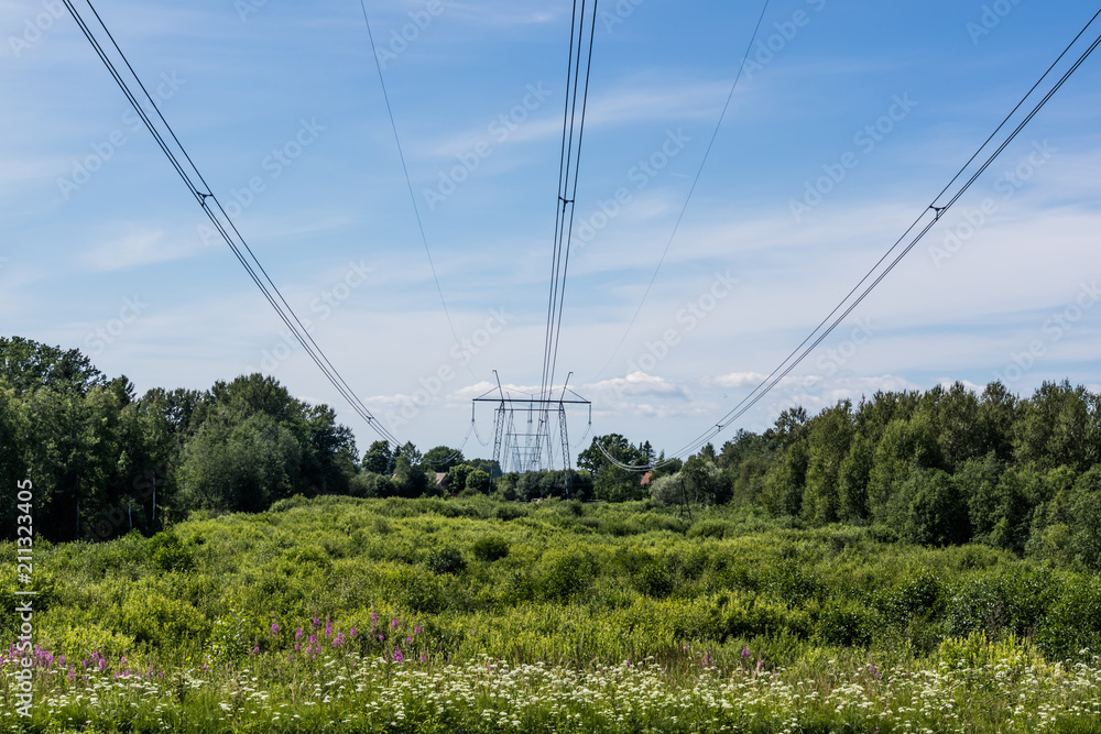 Power line towers and wires. Sunny day.