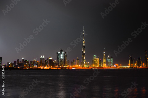 Dubai panorama at night, UAE - warm colors 