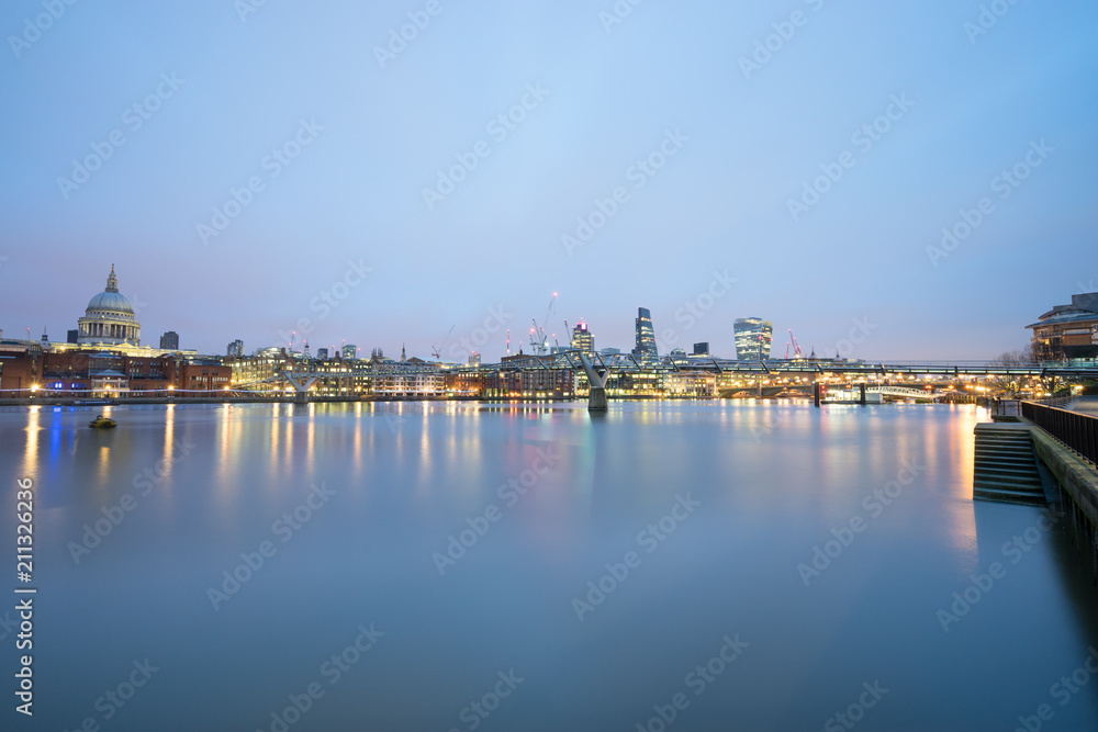 Skyline of London overlooking dome of St. Paul cathedral at dawn